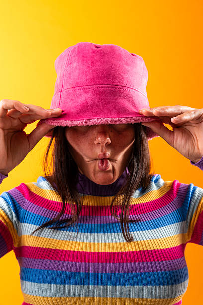Young woman expressing playful style in studio portrait