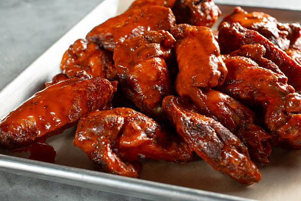 istock tray of Buffalo wings 2229504651