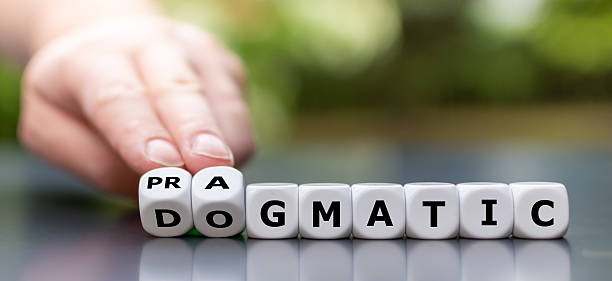 istock A image depicting the shift from dogmatic to pragmatic thinking,symbolized by turning dice. Ideal for illustrating concepts like adaptability, critical thinking, leadership change, and decision-making 2229509475