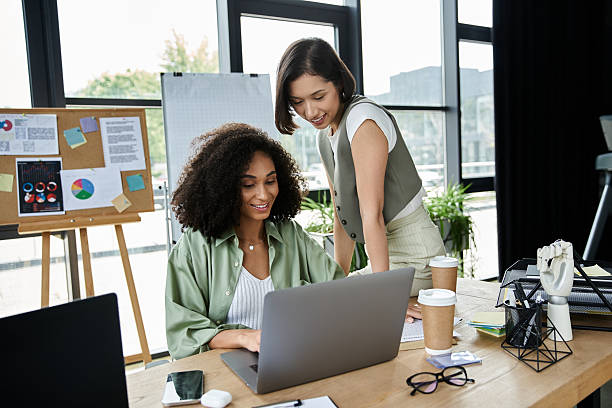 istock Loving couple collaborates on a project in a bright and modern workspace surrounded by creativity 2229513188