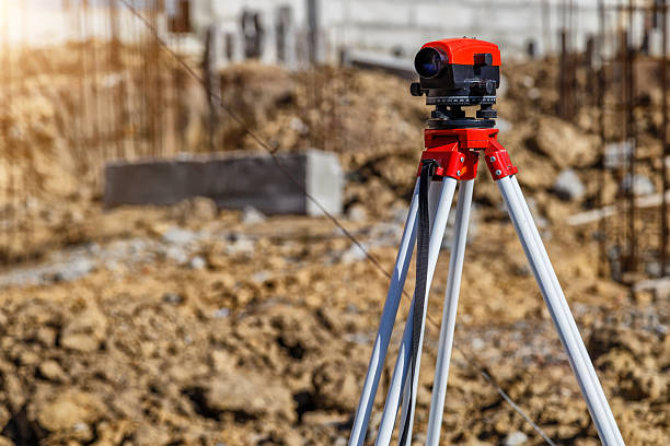istock Surveyor equipment GPS system or theodolite outdoors at highway construction site.Measuring instrument close-up. Surveyor engineering with total station 2229515602