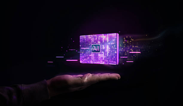 istock glowing AI chip hovers above hand in a dark tech futuristic themed. Artificial intelligence, advanced technology, and digital innovation 2229518698