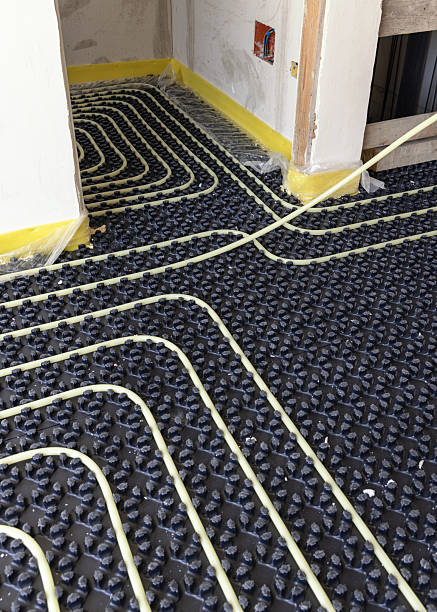 istock Floor heating installation in a new building, plastic pipes and pipelines. Underfloor heating system 2229522221