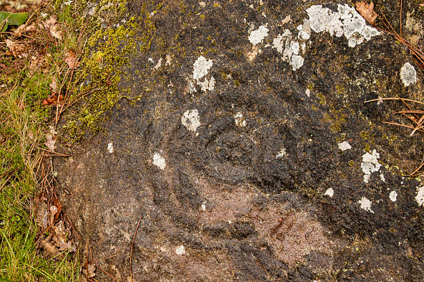 istock Rock petroglyph of concentric circles on granite rock. Freixo. Celanova. ourense 2229522813