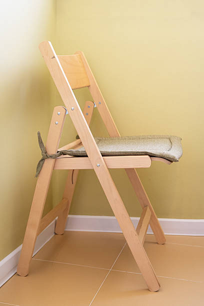 istock Wooden folding chair with cushion 2229527428