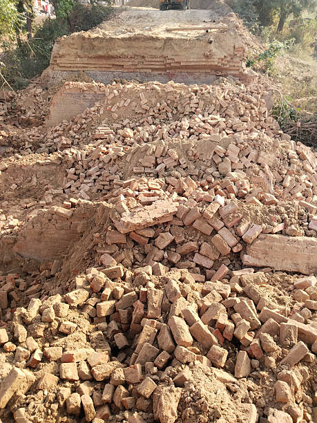 istock Demolished Old Bridge with Scattered Bricks and Earth Preparing for New Construction Reflecting Rural Development and Modern Engineering Under Open Sky with Vegetation and Future Infrastructure Plans 2229530841