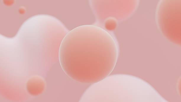 istock Soft pink balls float on the pastel background, creating a sense of depth 2229531360