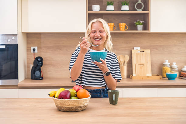 istock Young happy freshly divorced or recently single woman after toxic relationship breakup standing at kitchen in new apartment she rent drinking coffee or tea enjoying new beginnings and morning silence 2229532344