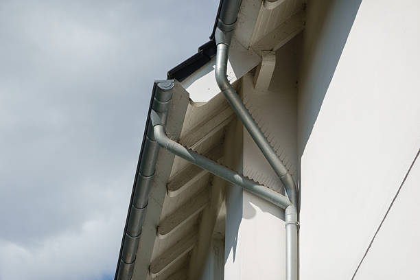 istock House Corner with Dual Rain Gutters and Tiled Metal Roof 2229532966