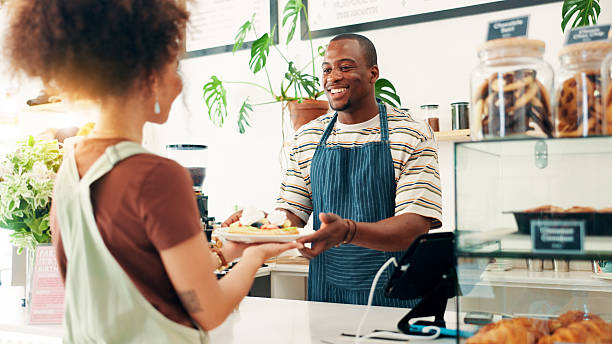 istock Waffle, smile and order for customer in bakery with man for food, hunger or serving as server or waiter. Buying, thank you and woman in deli with small business owner giving dessert for consumerism 2229535726