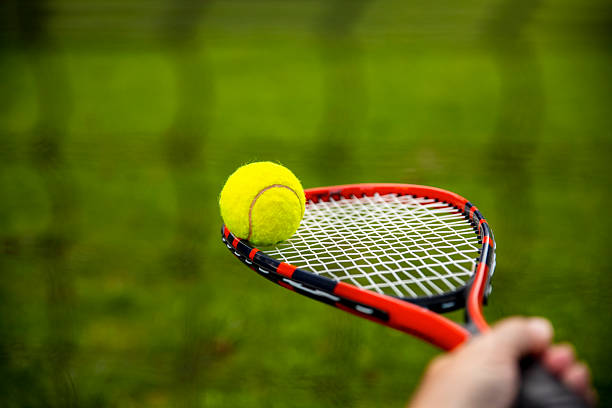 istock Cropped Hand Holding Tennis Racquet 2229537920
