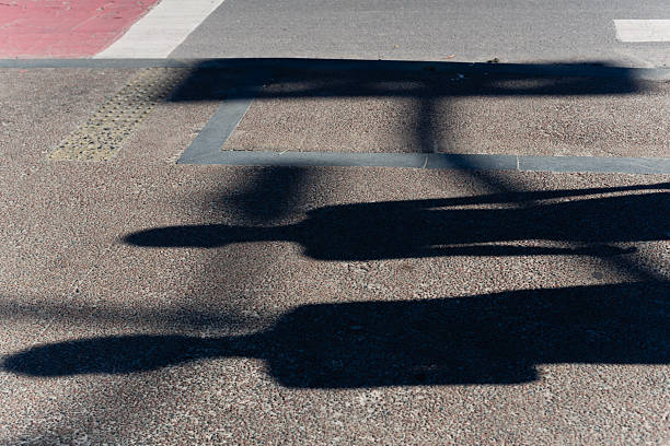 istock Shadow on the ground of two unidentified people. 2229539102