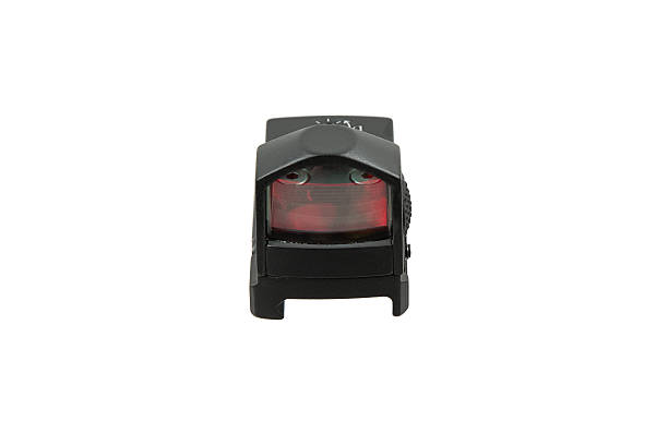 istock A black pistol red dot sight with a tinted lens, isolated on a white background. 2229540228
