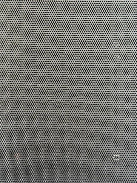 istock Captivating array of textures captured in a modern urban setting showcasing metal grids and intricate patterns 2229542077