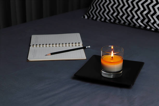 istock luxury aroma scented candle on nice table in bedroom for creating good relax ambient on Valentine day 2229543861