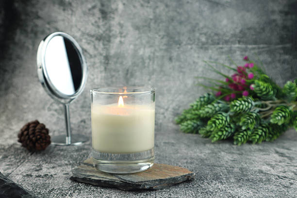 istock luxury aroma scented candle on nice table in bedroom for creating good relax ambient on Valentine day 2229543918