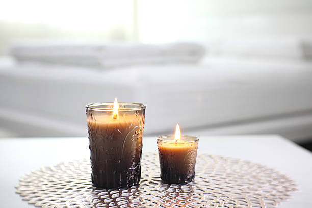 istock luxury aroma scented candle on nice table in bedroom for creating good relax ambient on Valentine day 2229543932