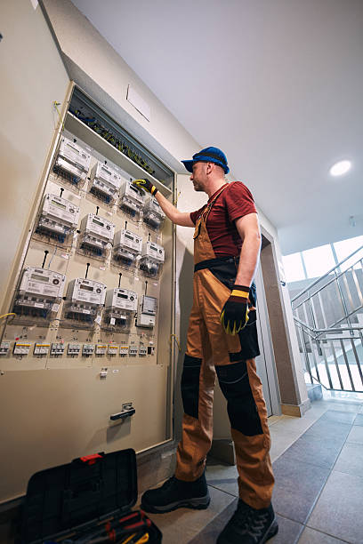 istock Electrician working on a modern electricity power meter station in a building. 2229546398