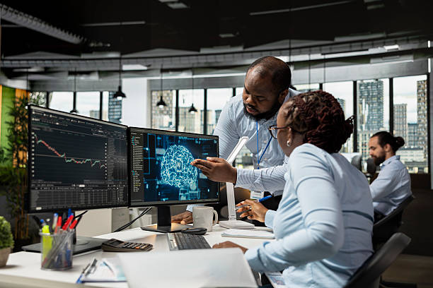 istock Team of traders in office using deep learning models to enhance accuracy 2229549815