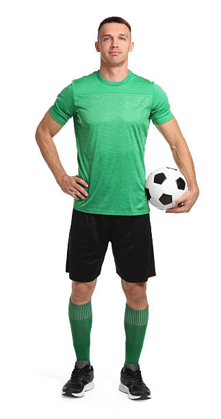 istock Football player with soccer ball on white background 2229553684