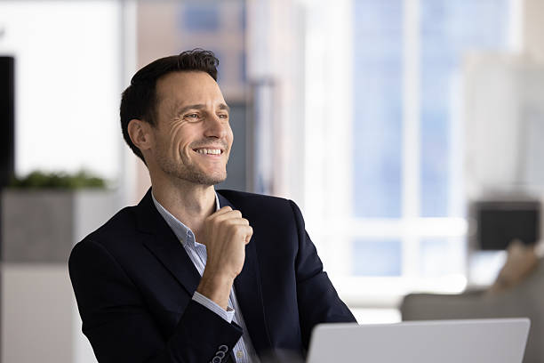 istock Happy confident handsome Latin CEO man looking away, smiling 2229553790