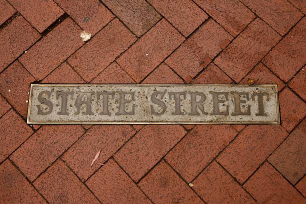 istock Corner street marker in the sidewalk 2229555873