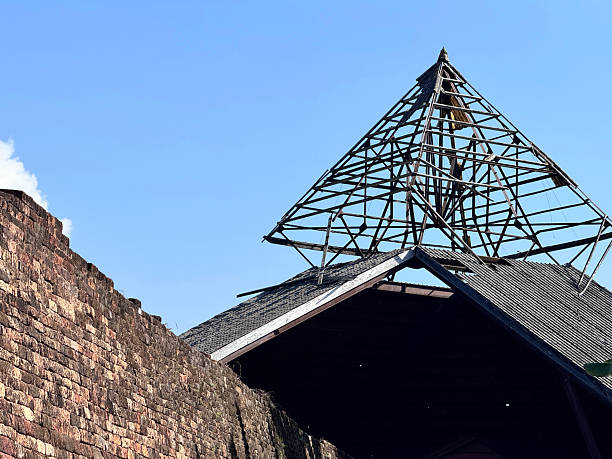 istock Historic Wall with Partially Collapsed Roof Frame 2229556154