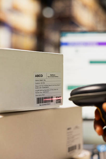 istock Close up of staff member managing barcodes awb scanning tasks 2229559727