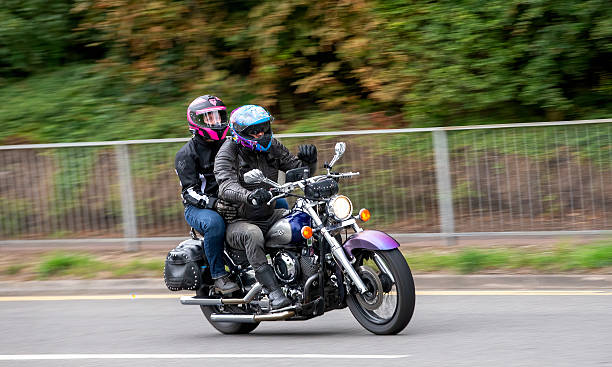 2 People Ride Motorcycle 90+ Motorcycle Riding Two People Pillion Stock Photos, Pictures ...