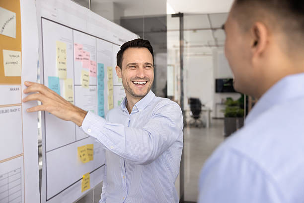 istock Cheerful male Hispanic project manager presenting startup teamwork plan 2229565503