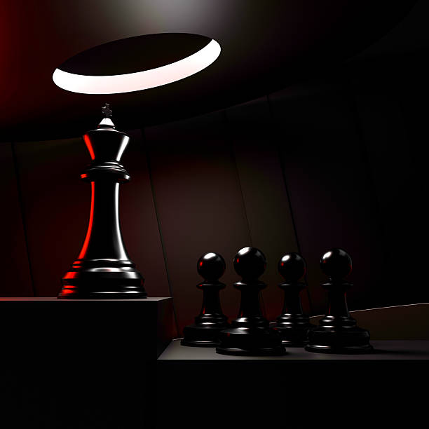 Black king and pawns in dramatic light, symbolizing leadership, hierarchy, and emotional authority in a minimal dark scene.