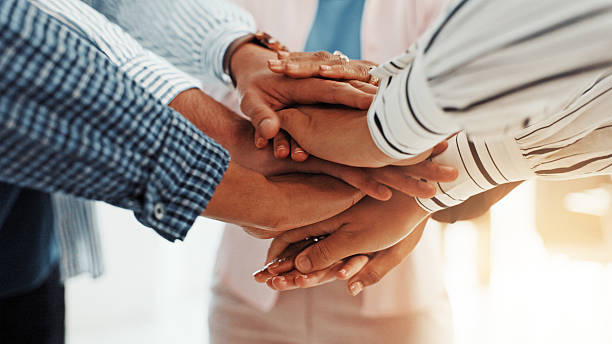 istock Stack of hands, solidarity and business people in office with teamwork, support or unity. Trust, partnership and group of corporate employees in huddle for collaboration, motivation or meeting. 2229571090