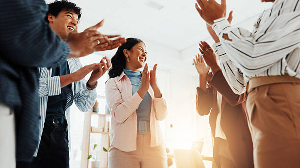 istock Happy, group and applause in office, success or celebration for sales target, colleagues or victory. Clapping, team and people with smile for achievement, together and excited for opportunity or win 2229571092