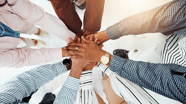 istock Stack of hands, teamwork and business people in office with support, collaboration or unity. Trust, top view and group of corporate employees in huddle for solidarity, motivation or meeting together. 2229571133