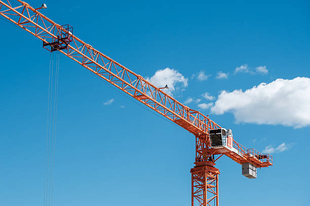 istock A large crane is in the sky with a blue sky background 2229577314