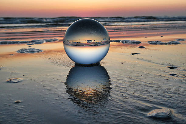 istock Crystal ball in Rimini beach during dawn 2229578852