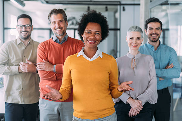 istock Confident businesswoman and her team. 2229582417