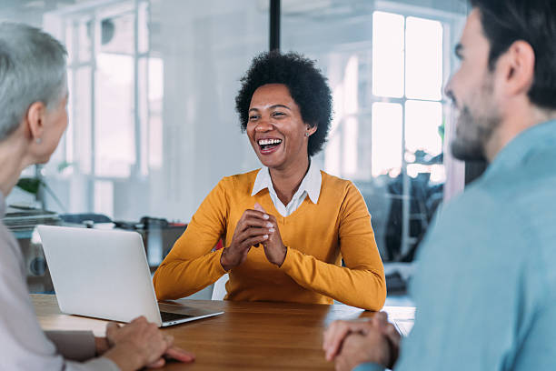 istock Group of business persons talking in the office. 2229582418