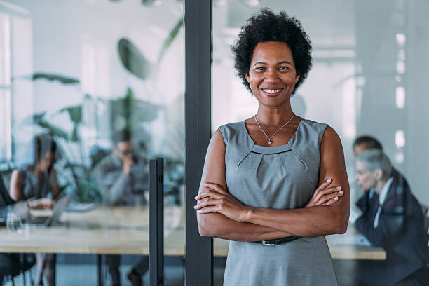 istock Confident businesswoman and her team. 2229582588