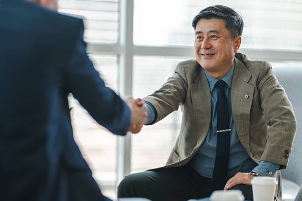 istock Strength in Diversity: Business Professionals Join Forces 2229582726