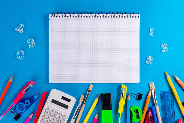 istock Notebook with alphabet magnets and school supplies 2229587447