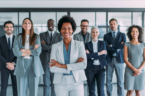 istock Confident businesswoman and her team. 2229590938