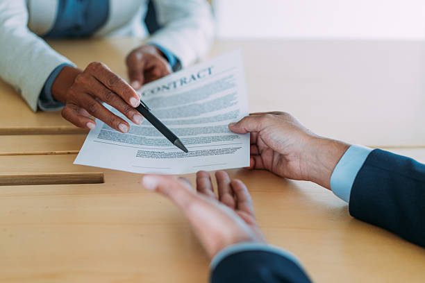 istock Business people signing a contract in the office. 2229591303