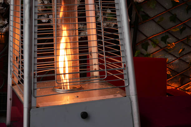 istock Outdoor heater providing warmth in cozy evening setting 2229598724