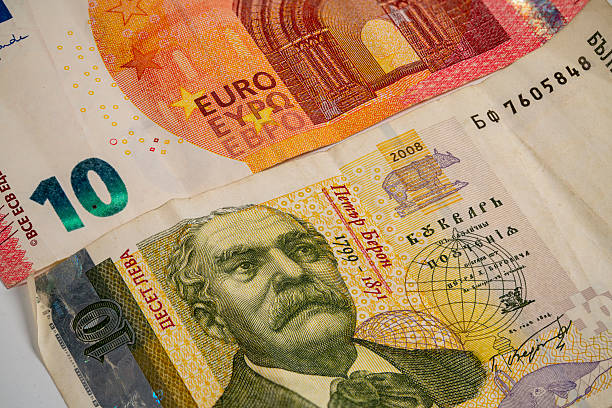 istock Currency Notes From Europe Displayed on a Wooden Surface 2229599150