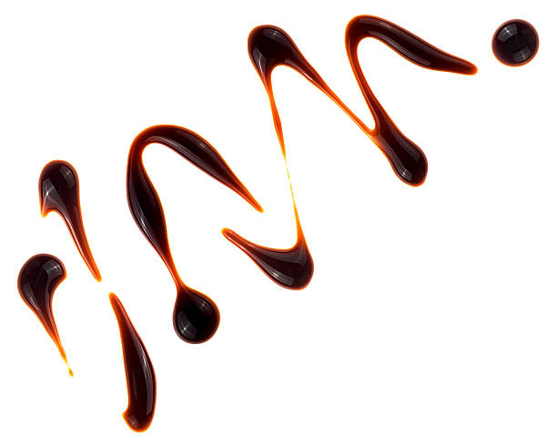 istock Sample of delicious balsamic vinegar isolated on a white background 2229601323