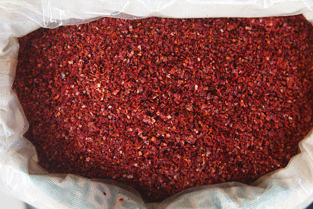 istock Spices displayed in a burlap sack at a market stand in summer 2229601421
