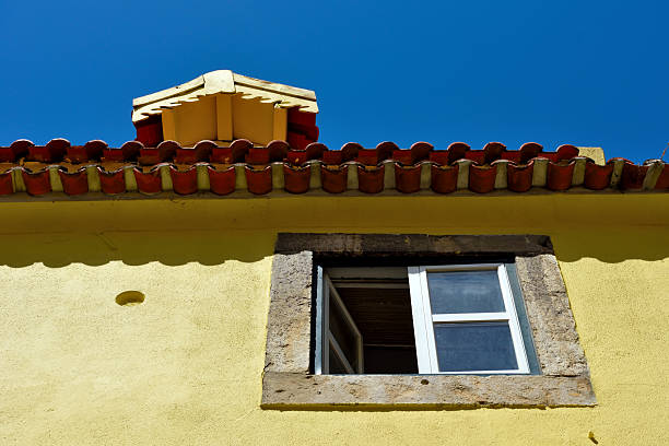Narrow and colorful streets, majestic facades, windows and balconies of Lisbon, Portugal