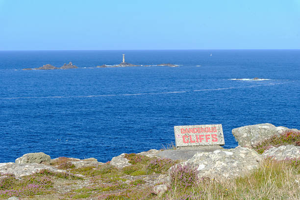 istock Cliffs and dangerous cliff path on the South West coastal path at Lands End Cornwall 2229611742