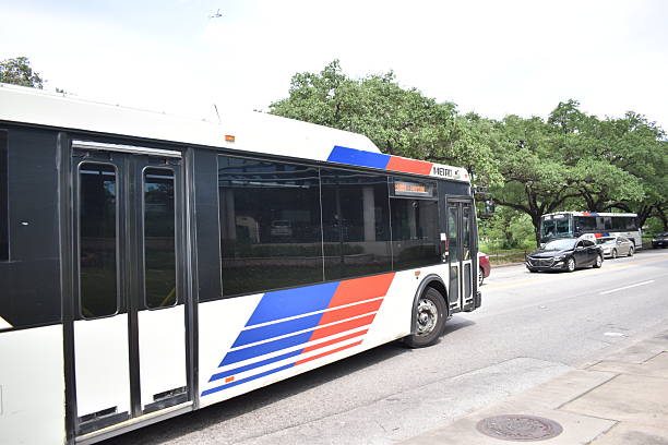 Houston, TX USA 4-18-2025 -  A portrait of a Metro Bus turning at an intersection